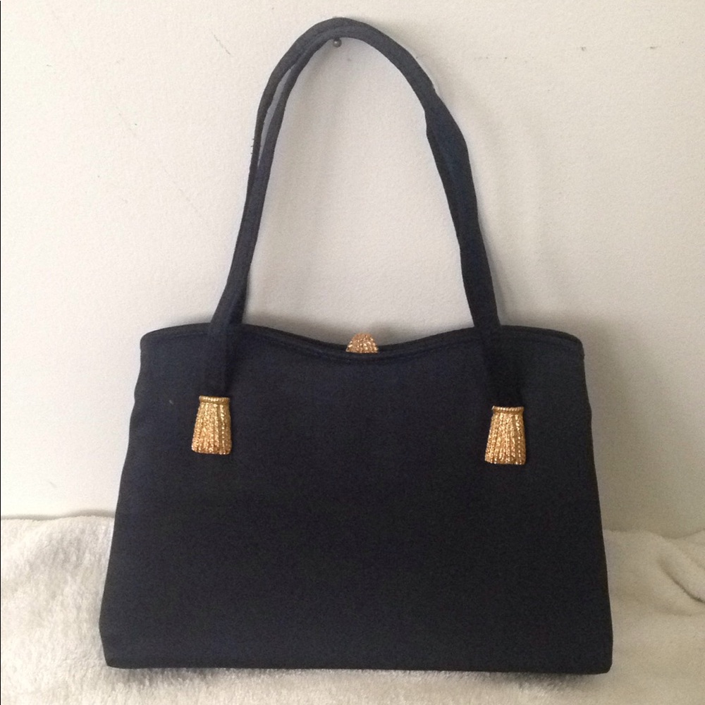 Vintage black satin evening bag with gold tassel accents